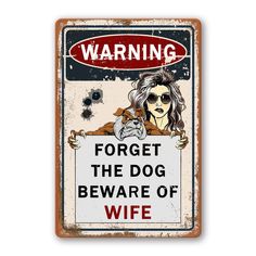 a warning sign for the dog beware of wife