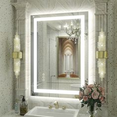 a bathroom sink sitting under a large mirror