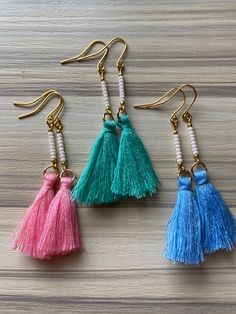 "I feel like these are so perfect for summer! Cute little tassels hanging from a beaded bar. Approximately 2\" long." Beaded Drop Earrings With Tassels For The Beach, Beaded Tassel Drop Earrings For Beach, Bohemian Beaded Earrings With Latkans For Summer, Summer Beach Tassel Earrings With Latkans, Fringe Dangle Jewelry For Vacation, Bohemian Tassel Earrings With Fringe For Vacation, Beach Drop Tassel Earrings With Latkans, Beach Drop Earrings With Tassel Latkans, Summer Beach Tassel Earrings With Dangling Beads