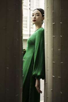 Elevate your wardrobe with this stunning Ao Dai. Crafted with luxurious silk, this timeless piece is elegant and tasteful, offering a sophisticated look with a touch of opulence. Make a statement and turn heads with this exclusive piece. Mesh Laundry Bags, Bishop Sleeve, Flat Iron, Sophisticated Look, Silk Fabric, Green Pink, Timeless Pieces, Online Fashion, Floor Length