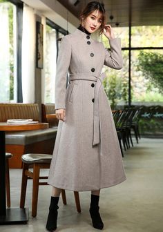 Elevate your winter wardrobe with our Stand Collar Single Breasted Flared Wool Blend Long Coat. Made from a luxurious wool blend, this single breasted coat features a stand collar and belted waist for a chic and flattering fit. The fit & flare style adds a touch of sophistication, making this long coat a must-have for any fashion-forward woman. Stay warm and stylish all season long! ●Single-breasted button closure●Stand collar ●Lined ●Front welt pockets ●Removable tie belt ●50% wool and polyeste Winter Long Coat, Winter Coat For Women, Gray Cashmere, Coat Autumn, Single Breasted Coat, Coat For Women, Stand Up Collar, Wool Blend Coat, Woolen Coat