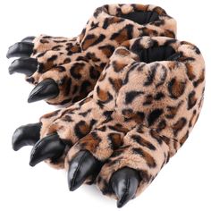 a pair of leopard print slippers with claws on the bottom and black toenails