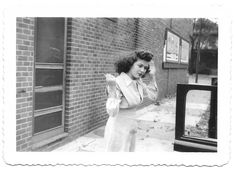 Vintage Snapshot “Windy Day” Robot Girl Combing Her Hair 1940’s Victory Roll Hairstyle Hairdo Curly Hair Black & White Vernacular Photo Victory Roll, Gloucester Massachusetts, Victory Rolls, Roll Hairstyle, Fishing Vessel, History Of Fashion, Black Curly Hair