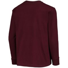 a maroon long sleeved shirt that has the word on it