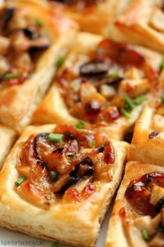 small square pizzas with mushrooms and cheese on them