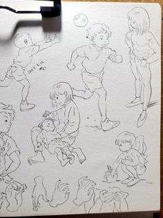 a piece of paper with drawings of children playing and having fun in the park on it