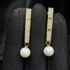 Add a touch of timeless elegance to your jewellery collection with this stunning white pearls earrings. Materials: 8mm shell pearls, gold or platinum plated brass earrings with inlaid zircon. Shell pearls are made from crushed shells. Oyster shells are cut and transformed into powder and then reformed into perfect pearl shape with an infinite shine.  They are very popular as a natural alternative to expensive pearls.  Matching choker here: https://perlettejewellery.etsy.com/listing/1748630709 Ma Elegant Pearl Embellished Cubic Zirconia Earrings, Luxury Pearl Earrings With Cubic Zirconia For Evening, Pearl-embellished Cubic Zirconia Drop Earrings, Gold Pearl Earrings With Diamond Accents And Cubic Zirconia, Pearl White Cubic Zirconia Pearl Earrings For Evening, Luxury Cubic Zirconia Pearl Earrings For Formal Occasions, Luxury Pearl Diamond White Earrings, Elegant Cubic Zirconia Diamond Earrings With Pearl Drop, Luxury Pearl Diamond Earrings In Diamond White