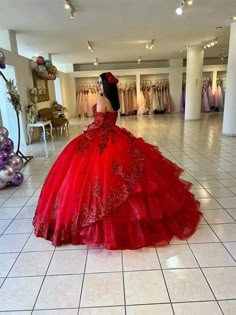 Make a grand entrance with this stunning red sweetheart quinceanera dress. This dress is crafted in luxurious lace fabric and features a dramatic chapel train that adds an element of elegance and sophistication. The long sleeves and lace-up back provide a perfect blend of tradition and modernity, while the appliqued embellishments bring intricate detailing to the forefront. Details: Silhouette: Ball-Gown Style Fabric: Lace Fabric Color: Red Color Length: Chapel-Train Neckline: Sweetheart Necklin Red Quinceanera Dresses Butterfly, Quinceanera Dresses With Long Sleeves, Red Xv Dresses, Dark Red Quinceanera Dresses, Red Quince Dress, Red Quinceanera Ideas, Puffy Prom Dresses, Quinceanera Dresses Red, Mexican Quinceanera Dresses