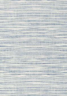 a blue and white rug with lines on it