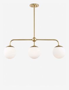 three light brass chandelier with white glass globes on the bottom and sides