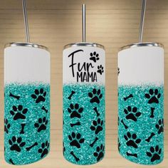 three tumbles with dog paw prints on them and the words fur mama written in black ink