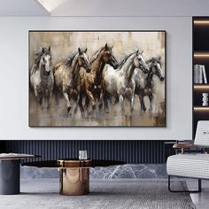 a group of horses running in a line on a wall next to a table and chair