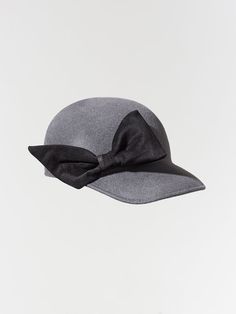 Misa Harada Millinery The Kristin hat from the Ladies Lux Collection for Autumn Winter, Baseball cap in Grey Velour felt and with a black suede bow. 100% Velour, Made in UK We can also adjust it to your requested size. Please specify your size in the order notes (S 57cm, M 58cm, L 59 cm). Classic Brimmed Hat With Bow, Flat Brim Hat With Bow For Kentucky Derby, Classic Adjustable Hat With Bow, Cloche Hat With Bow For Kentucky Derby, Classic Short Brim Hat With Bow, Chic Hats With Bow And Curved Brim, Black Brimmed Hat With Bow, Black Hat With Bow And Curved Brim, Kentucky Derby Black Hat With Bow