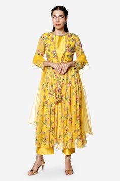 Amber yellow kurta set featuring a long jacket with floral prints and hand embroidery. Paired with a matching kurta, pant, and dupatta in chanderi fabric., Fit: Relaxed Designer Anarkali Set For Spring, Spring Anarkali Kurta With Sheer Dupatta, Spring Anarkali Set With Zari Work And Traditional Drape, Spring Anarkali Set With Traditional Drape, Anarkali Sharara With Gota Work For Spring, Spring Festive Anarkali Set With Traditional Drape, Spring Gota Work Anarkali Set With Traditional Drape, Spring Yellow Chanderi Anarkali Set, Spring Anarkali Set With Gota Work