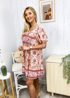 The Emes Shop dress is detailed with feminine puff sleeves. Features a floral print. tie neck detail. flowy skirt. and above knee length. Pair it with a sun hat and strappy sandals for a boho look.MATERIAL:100% ViscoseMEASUREMENTS: Product Length 35"-37.5"in 4-6-Small | Waist: 25"-26.5"in | Chest: 33"-34.5"in | Hips: 33.5"-35"in 6-8-Medium | Waist: 26.5"-28"in | Chest: 34.5"-36"in | Hips: 35"-36.5"in 8-10-Large | Waist: 28"-29.5"in | Chest: 36"-37.5"in | Hips: 36.5"-38"in 10-12-X-Large | Waist: Casual Boho Dress For Garden Party, Bohemian Floral Print Sundress For Spring, Casual Summer Peasant Dress, Mini Length, Casual Summer Peasant Dress Mini Length, Casual Peasant Dress For Spring Vacation, Casual Mini Length Peasant Dress For Spring, Casual Mini Length Peasant Dress For Summer, Casual Boho Print Sundress For Summer, Short Sleeve Floral Print Dresses For Summer Outings