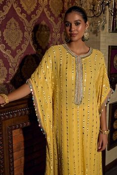 Yellow kaftan with mirror embroidery. Paired with a pant. - Aza Fashions Festive Bohemian Kaftan With Gota Work, Bollywood Style Kaftan With Dupatta For Festivals, Bohemian Kaftan With Gota Work For Festivals, Bollywood Style Tunic Kaftan For Festivals, Festive Kaftan With Gota Work For Navratri, Festive Gota Work Kaftan For Navratri, Georgette Straight Kurta Kaftan For Festivals, Festivals Straight Kurta Kaftan With Gota Work, Festival Kaftan With Dupatta In Georgette