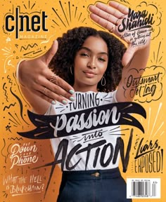 a magazine cover with an image of a woman holding her hands up in the air