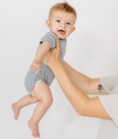 You're going to love our basic onepiece. This super soft, classic style takes on a modern twist that is perfect for layering or all by itself. Details: Color: Grey Ribbed cotton/spandex blend, allowing the perfect fit Ribbed neckline Rolled sleeve cuffs Inner leg snaps for easy diaper changes Material + Wash: 95% cotton | 5% spandex Buttery soft with the perfect amount of stretch Machine wash with like colors on cold Dry on low heat Do not bleach May experience slight shrinkage on first wash Avo Unisex Playful Onesie For Loungewear, Cotton Onesie For Loungewear, Super Soft Cotton Onesie For Loungewear, Comfortable Cotton Loungewear Onesie, Stretch Cotton Short Sleeve Bodysuit For Loungewear, Soft Fitted Onesie For Playtime, Unisex Cotton Onesie For Loungewear, Basic Loungewear Bodysuit, Basic Bodysuit For Loungewear