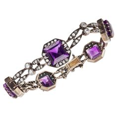 5 passionate carré-cut amethysts of intense color and brilliance weighing approximately 14 carats mounted in an antique "Belle Époch" silver link bracelet with 80 single-cut diamonds weighing approximately 2.50 carats. Luxury Vintage Purple Bracelets, Luxury Amethyst Bracelets For Formal Occasions, Formal Purple Fine Jewelry Bracelet, Antique Purple Bracelets For Formal Occasions, Luxury Purple Jeweled Jewelry, Luxury Purple Rectangular Jewelry, Luxury Rectangular Amethyst Jewelry, Formal Amethyst Bracelets With Gemstone Accents, Luxury Purple Bracelets For Wedding