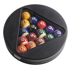 an image of pool balls in the shape of a triangle on top of a black case