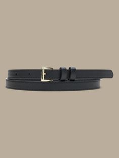 This skinny belt dresses up any outfit.  Single prong buckle. Trendy Adjustable Belt For Formal Occasions, Trendy Adjustable Formal Belt, Classic Belt Buckles For Workwear, Classic Adjustable Belt Buckles For Workwear, Adjustable Belt For Formal Occasions In Spring, Adjustable Formal Belt For Spring, Chic Formal Belt, Spring Formal Adjustable Belt, Black Belt For Workwear