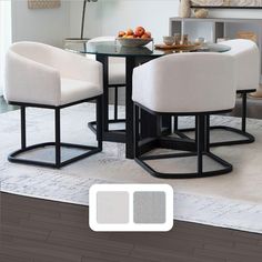 a dining room table with four chairs and a bowl of fruit on the centerpiece