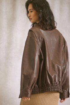 An Oversized Leather Bomber? Yes please! The Details: Cool girl fall is here and you need this Dark brown vegan leather jacket to complete every outfit. Oversized Leather Outerwear For Fall, Fall Leather Jacket For Streetwear, Oversized Faux Leather Outerwear For Fall, Chic Oversized Leather Jacket For Fall, Oversized Chic Biker Jacket For Fall, Oversized Faux Leather Outerwear For Spring, Oversized Leather Jacket With Pockets For Fall, Oversized Biker Jacket For Workwear In Fall, Brown Faux Leather Outerwear For Fall