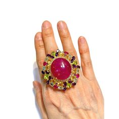 Cluster Multi Color Fancy Gems from Sri Lanka Ruby - 12 Carat Amethyst - 3 Carat Peridot - 2 Carat Blue Topaz - 2 Carat Citrine 3 Carat White Topaz - 1 Carat  This Ring is from the "Orient" traveling collection are the epitome of elegance and versatility. It offers a perfect blend of day to night and swimwear to evening wear, allowing you to effortlessly transition between different occasions and outfits. Wearing these spectacular oriental-style ring will undoubtedly make you the center of atten Multi-stone Party Rings, Fine Jewelry Style, Fine Jewelry Multi-stone Rings For Party, Luxury Multicolor Oval Gemstones, Luxury Multi-stone Pink Gemstones, Yellow Gold Multi-stone Rings For Party, Luxury Multi-stone Rings For Party, Luxury Multicolor Amethyst Ring As Gift, Luxury Pink Multi-stone Gemstones, Luxury Multicolor Amethyst Ring For Gift