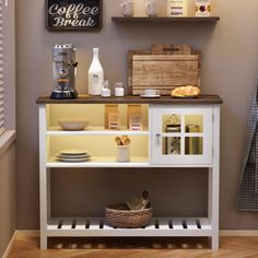 a coffee bar with two shelves on the wall above it and a basket in front of it