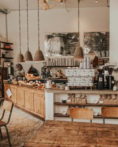 a coffee shop with wooden tables and chairs