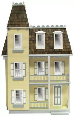 a large yellow doll house with windows and balconies on the second floor,