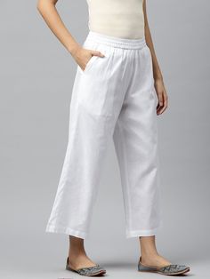 An amazing range of women's bottom wear in soft and solid colors that looks perfect for regular wear.  Description  Size - Measuring Unit     : Regular Size                                   :  ( S, M, L, XL, XXL )  Fit                                      :Regular Fit Ideal For                           :Women Fabric                               :Pure Cotton Occasion                         :Casual Color                                : White Brand Color                     : White Pattern Casual White Capris For Loungewear, White Plain Bottoms For Summer, Plain White Summer Bottoms, Casual White Plain Pants, White Harem Pants With Elastic Waistband, White Straight Pants For Loungewear, White Relaxed Fit Pants With Elastic Waistband, White Cotton Ankle-length Pants, White Ankle-length Cotton Pants