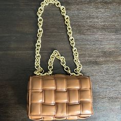 Chic Woven Carmel Brown Handbag With A Beautiful Heavy Chain Strap Brown Rectangular Shoulder Bag With Chain, Brown Square Bag With Gold-tone Hardware, Brown Shoulder Bag With Chain Detail, Brown Shoulder Bag With Chain, Brown Square Bag With Chain Strap, Brown Chain Bags, Brown Square Shoulder Bag, Brown Rectangular Satchel With Chain Strap, Brown Chain Bag For Everyday Use