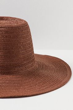 Stay away from the rays in this oversized straw hat, featuring a large, floppy brim perfect for all-day lounging by the pool or beach. * Lightweight * Packable, unstructured design | Shady Character Packable Wide Brim Hat by Free People in Brown