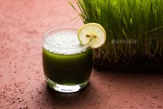 Wheat Grass Juice by stockimagefactory. Ayurvedic or medicinal Wheat grass juice with lemon slice in glass, selective focus #Sponsored #stockimagefactory, #Ayurvedic, #medicinal, #Wheat Wheat Grass, Lemon Slice, Wheat, Food Photo, Vitamins, Juice, Lemon, Diet, Nutrition