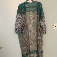 Nwot Boutique Kimono Duster Onesize Light Weight Polyester Great As Cover Up Or With Jeans/Shorts Or White Dress Colors: Variations Of Turquoise, White, Brown/Tan Casual Patterned Kimono For Beach Cover-up, Casual White Kimono For Festival, Casual Printed White Kimono, Casual White Printed Kimono, Casual V-neck Patterned Kimono, Casual Free Size Printed Kimono, Casual Printed Free Size Kimono, Casual Printed Free-size Kimono, Casual Blue Kimono For Festival