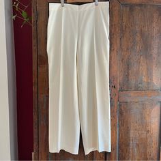 This Creamy White 100% Silk Pant By Akris Is Absolute Luxury! Fully Lined. Gorgeous. Purchased At Saks, Tags Still Attached Size 12, Check Measurements White Silk Wide-leg Pants, White Silk Wide Leg Pants, Classic Silk Wide Leg Pants, Classic Silk Straight Leg Pants, Classic Silk Straight Leg Dress Pants, Classic Silk Dress Pants With Straight Leg, Elegant White Silk Pants, Elegant Silk Pants With Tapered Leg, Classic Full Length Silk Pants