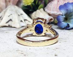 Don't miss this opportunity to own this beautiful gemstone ring crafted in 14k gold filled => Gemstone Type - Corundum Sapphire, Clear Quartz => Gemstone Cut - Faceted => Gemstone Size - 8*10 mm, 3 mm => Total Number of Gemstones - 3 => Metal Type - 14k Gold Filled (Tarnish Resistant And Nickel Free) - also available in 925 sterling silver * Please contact me for pricing on a sizes larger than 11 * ~ Feel free to ask me about custom made designs. ❏ Replacements and custom orders : Gold Oval Sapphire Cluster Ring, Gold Sapphire Oval Cluster Ring, Oval Sapphire Cluster Ring In Gold, Oval Birthstone Ring With Vs Clarity In 14k Gold, Gold Oval Sapphire Promise Ring, Gold Sapphire Birthstone Ring, Oval Shape, Gold Sapphire Promise Ring, Oval Cut, Gold Oval Crystal Ring With Center Stone, Oval Gold Sapphire Promise Ring