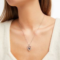 This pretty necklace for her features a double heart-shaped pendant traced in shimmering diamond accents. At the center sits a beautiful heart-cut blue lab-created sapphire to complete the romantic design. The sterling silver pendant is suspended from an 18-inch box chain and secures with a lobster clasp. Anniversary Necklace With Lab-created Sapphire Birthstone, Sapphire Heart Pendant Jewelry For Anniversary, Sapphire Heart Pendant Jewelry In Cubic Zirconia, Silver Sapphire Heart Pendant Necklace, Sapphire Heart Pendant Necklace For Anniversary, Sapphire-colored Cubic Zirconia Heart Pendant Jewelry, Sapphire Heart Necklaces For Anniversary, Sapphire Heart Necklace For Anniversary, Heart-shaped Sapphire Necklace For Anniversary