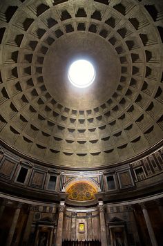 the inside of a building with a round window