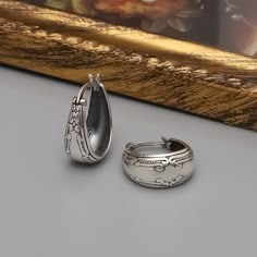 "READY TO SHIP Size:  L : 0,79\" | W : 0,87\" ►925K sterling silver, they are tarnish free and waterproof, safe for sensitive skin. Perfect for everyday wear. ► In order for the products to be used longer without losing their properties,should be avoided contact with perfume, water and liquid chemicals. ► Each purchase will arrive packaged ready to give as a gift, in a protective box. ► You can leave a special message that you want written in the box during checkout. ► Material Content: 925K Ste Silver Clip-on Earrings For Anniversary, Artistic Silver Metal Hoop Earrings, Ornate Engraved Sterling Silver Earrings, Classic Engraved Sterling Silver Earrings, Silver Engraved Round Earrings, Classic Engraved Silver Earrings, Elegant Engraved Metal Earrings, Vintage Sterling Silver Clip-on Earrings For Gift, Vintage Sterling Silver Dangle Hoop Earrings