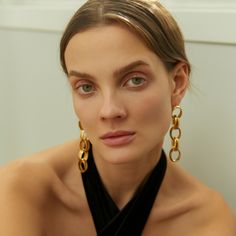 Perfect your look with a pair of luxe gold chain earrings. With their minimalist, eye-cathing design, the delicate and sophisticated Neith Chain Earrings will add an instant touch of glamour to your everyday look. Handcrafted with 24k Gold plated brass Nickel, lead and cadmium free Earring pins are made of gold plated 925 silver which are non-allergenic Suitable for pierced ears  Care To prevent oxidization and maintain long durability, keep your jewelry free of perfume, lotions, and sprays whil Minimalist Gold Plated Earrings For Party, Chic Gold-tone Earrings For Evening, Modern Yellow Gold Earrings For Party, Chic Gold Plated Linear Earrings For Formal Occasions, Chic Gold Linear Earrings For Evening, Modern Gold Plated Earrings For Evening, Modern Gold Plated Evening Earrings, Elegant Chain Earrings For Evening, Elegant Evening Earrings With Chain Detail