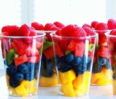 several cups filled with different types of fruit