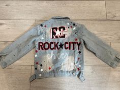 Personalized kid cheer team jean jacket with name on sleeve! Cheer Coach Jean Jacket, Team Jean Jacket, Cheer Jackets, Cheer Designs, Dance Jackets, Kids Cheering, Jacket Patches, Cheer Coaches, Denim Jacket Patches