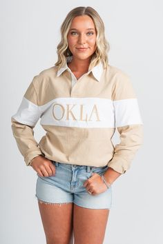 OKLA rugby polo shirt from Lush Fashion Lounge women's boutique in Oklahoma City. Lush boutique in OKC has a variety of cute Okie and Oklahoma tops, tees, and more! Show your state pride in this trendy OKLA rugby top! Model is 5'4 size 26 wearing size small. 100% cotton Relaxed Fit Long Sleeve Tops For School Spirit, Long Sleeve Tops With Relaxed Fit For School Spirit, Collared Tops For College In Spring, Fall College Collared Tops, Fall Collared Tops For College, Collared Fall Tops For College, Long Sleeve Tops For School Spirit In Fall, College Long Sleeve Tops With School Spirit, Preppy Collared Relaxed Fit Tops