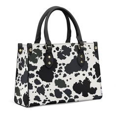 Grab the hottest fashion statement of the season with this Moo-licious Cow Print Luxury Tote Handbag! Perfect for giving your everyday look a sweet and sassy twist, this bag is sure to turn heads. It's made from a high-quality, durable material that will keep your belongings safe and secure making it as functional as it is fashionable. Moo-ve over handbags, this moo-tastic tote can't be beat! Features: . 100% high-grade vegan leather . Polyester lining w/ 2 internal pockets . Reinforced handles Chic Double Handle Satchel As Gift, Chic White Satchel As Gift, Chic Double Handle Bag For Gift, Trendy Double Handle Box Bag For Gift, Trendy Double Handle Box Bag Gift, Chic Satchel With Top Carry Handle, Chic Satchel With Top Carry Handle As Gift, Chic Satchel As Gift With Top Carry Handle, Trendy Double Handle Satchel As Gift