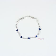 "LarkKing BR32 Heart bracelet crystal necklace, blue heart bracelet, blue bracelet, White gold plate stainless steel, crystal Size: length, 6 1/2\", adjustable +1\"; width, 3/16\" Blue Extra extension (one link, 1\"+) is available upon request. Gift boxes are available at https://www.etsy.com/shop/LarkKing?section_id=20001206 Sterling silver initials (add-on) are available at https://www.etsy.com/shop/LarkKing?section_id=20032040 LarkKing Categories at: https://www.etsy.com/shop/LarkKing LarkKin Adjustable Blue Crystal Bracelet For Anniversary, Blue Metal Bracelets For Wedding, Blue Metal Wedding Bracelets, Bracelet White Gold, Sterling Silver Initial, Bracelet Crystal, Unique Wedding Gifts, Bracelet Blue, Necklace Blue