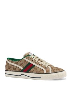 Gucci Men's Tennis 1977 Gg Canvas Lace Up Sneakers Gucci Classic Sneakers For Streetwear, Classic Gucci Sneakers For Streetwear, Vintage Low-top Sneakers With Embroidered Logo, Brown Gucci Sneakers For Streetwear, Classic Gucci Sneakers, Mens Tennis, Buy Gucci, Lace Up Sneakers, Sneakers Online