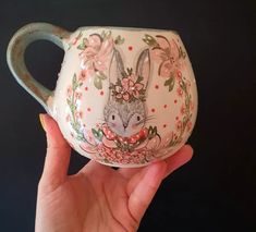 Do you want to experience the magic of the forest? Then do so in the morning with this jungle bunny mug and say hello to nature. Or take a stroll in the afternoon with a cup of tea. Carefully glazed and fired. With its raw clay surface with rabbit motif, this beautiful mug gives a feeling of connection with nature. Measurements 400 milliliters Hand washing will make this ceramic mug last longer. All our products are carefully handmade. There may be slight differences. * Worldwide Shipping from T Painted Mug, Teacup Animals, Animal Cups Ceramics, Fairy Mug Ceramics, Ceramic Mugs With Animals Inside, Mugs With Animals Inside, Rabbit Mug Ceramics, Painted Cups, Mug Cozy