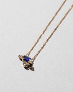 Cosmic Dawn Necklace on light color background. Blue Green Sapphires, Dark Sapphire, Colorless Diamond, Colombian Emeralds, Fashion Jewelry Sets, Sapphire Pendant, Band Jewelry, Pink Gemstones, Necklace Online